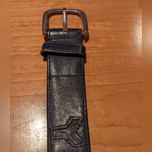 Vintage Yves Saint Laurent blue leather belt size 42 with logo.